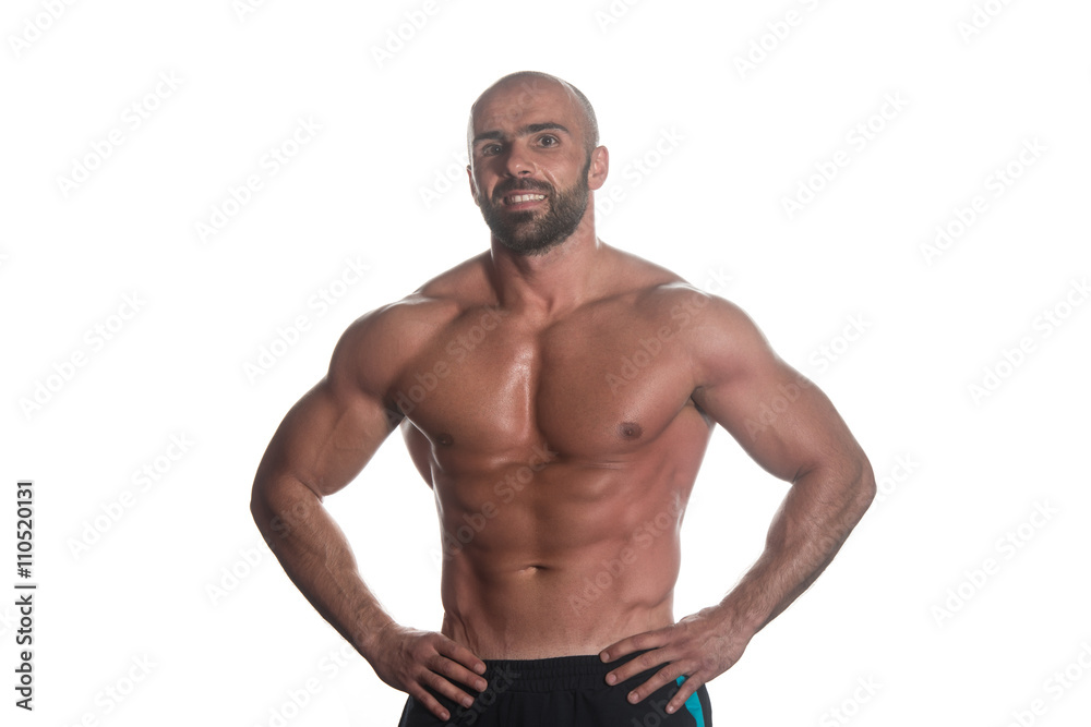 Muscular Bodybuilder Man Posing Over White Background