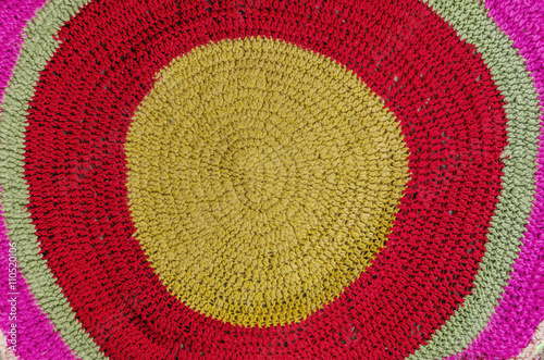 Part of a handmade thready rug as texture background.Closeup shoot