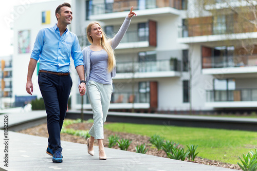 Young couple in modern residential area
 photo