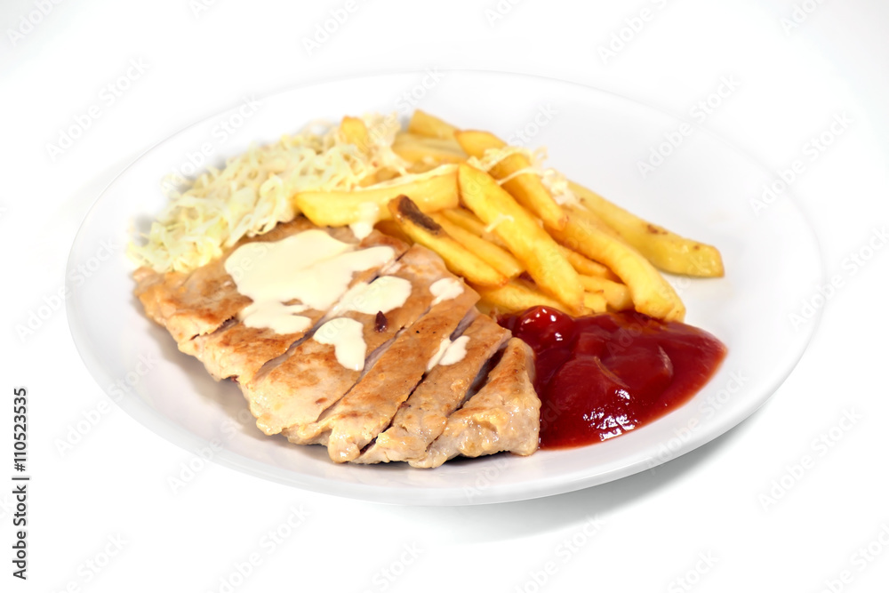 Fried pork / Fried pork and fried potatoes with ketchup on white plate. Fried pork / Fried pork and fried potatoes with ketchup on white plate.