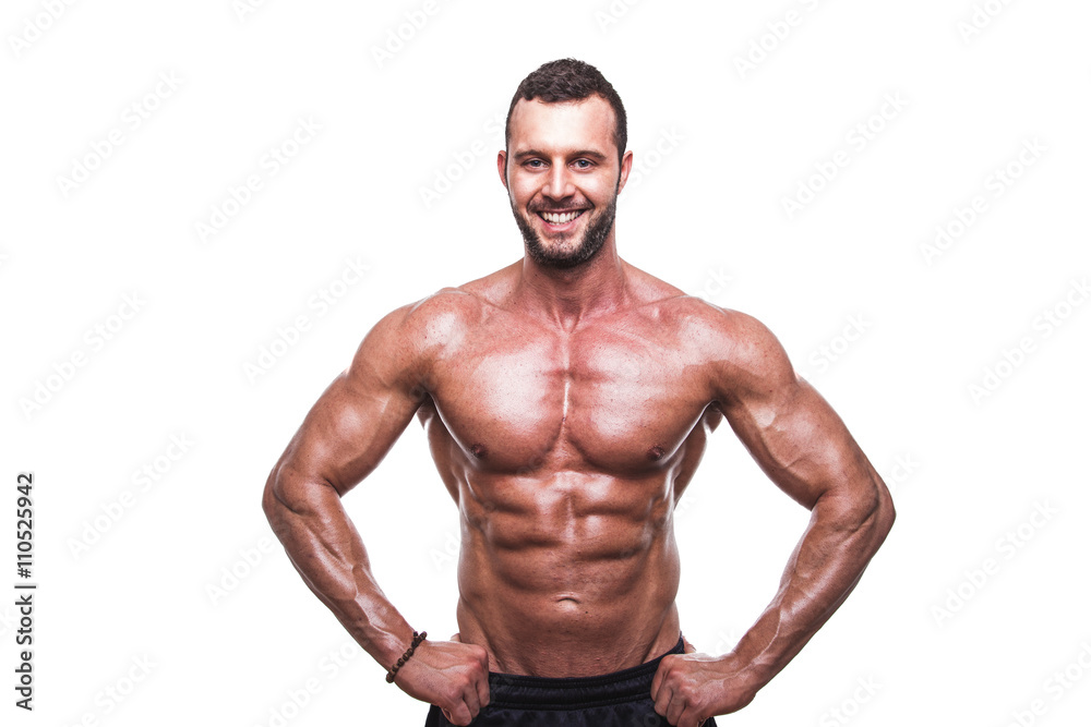 Handsome muscular man posing in studio. Handsome muscular man posing in studio.