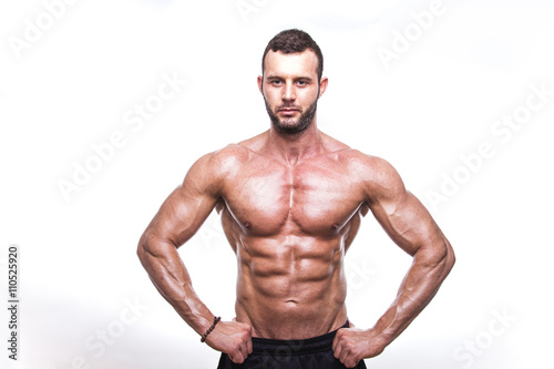 Sexy and fit man posing in studio.