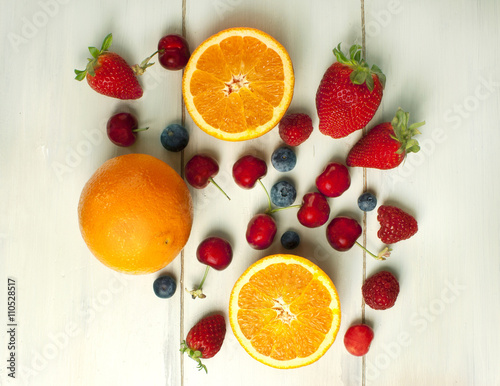 Fresh fruits  oranges  strawberries  cherries  blueberries  and raspberries
