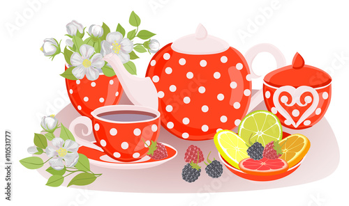 Kettle Tea Cup, sugar, flowers, citrus and berries on the table.