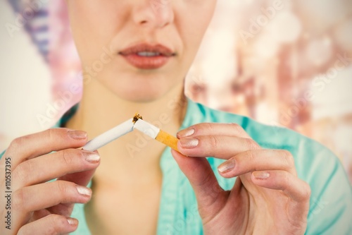 Composite image of close-up of woman holding cigarette 