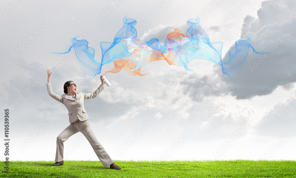 Woman use paint spray