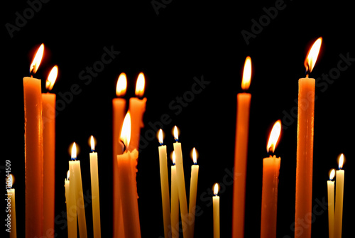 Set of candles in the dark concept of religion