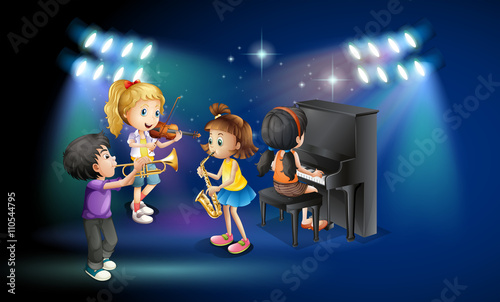 Kids playing music on stage