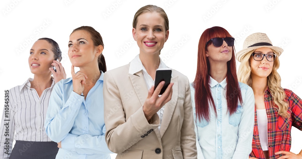 Fototapeta premium Composite image of laughing stylish businesswoman holding smartp