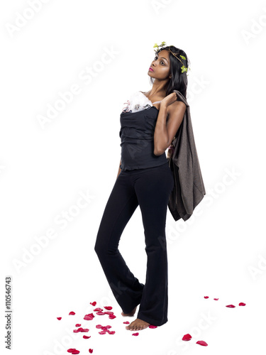 young indian woman wearing a wreath and posing. photo