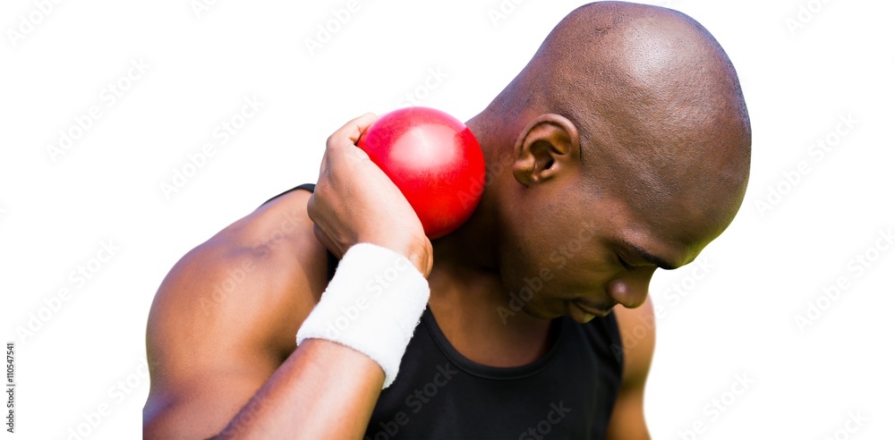 Portrait of sportsman practising shot put Portrait of sportsman practising shot put