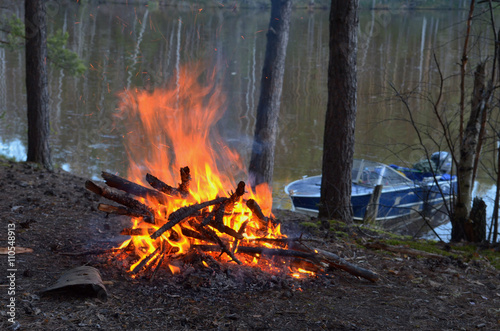Fototapeta Naklejka Na Ścianę i Meble -  Night bonfire on the river