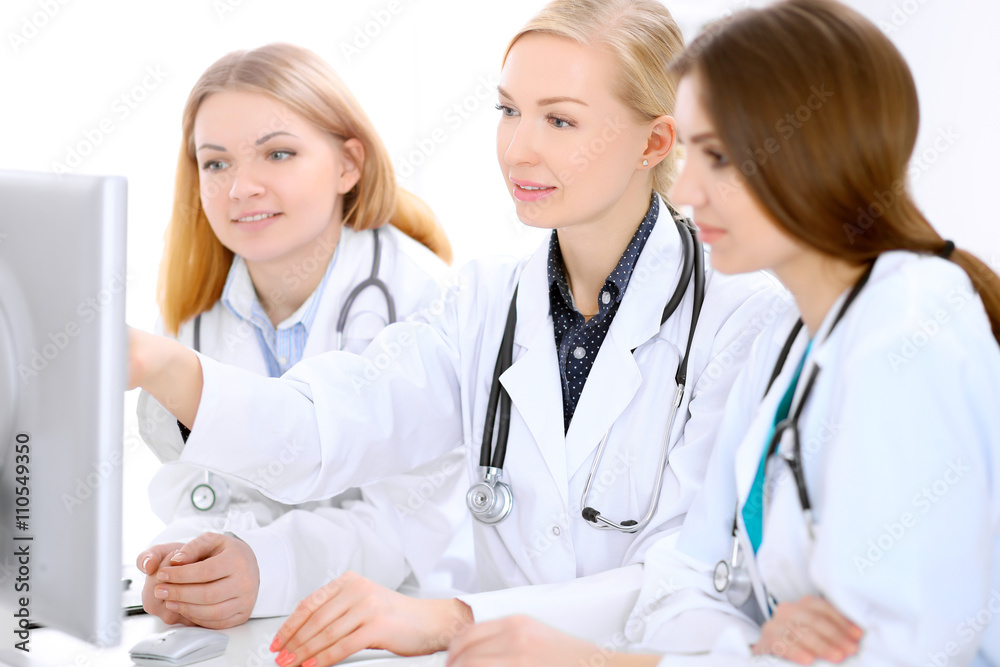 Female doctor leading a medical team at the hospital Female doctor leading a medical team at the hospital