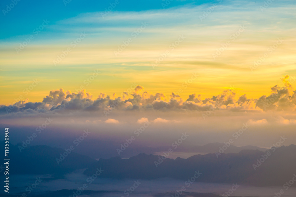 Colourful Sunrise on mountains with blue sky Colourful Sunrise on mountains with blue sky