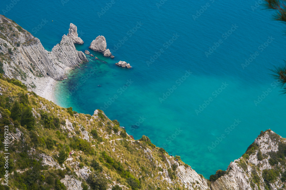 Summer vacation on the adriatic sea. Panoramic view of la spiaggia delle due sorelle, Monte Conero, Italy.