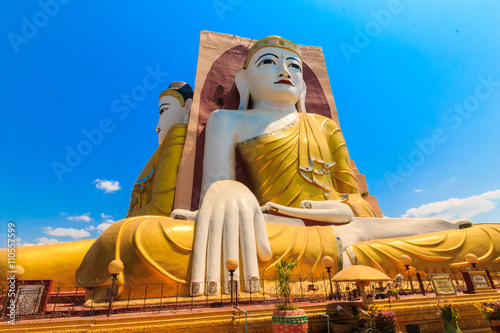 Four direction buddha statue temple at Kyaikpun Buddha, Bago, Myanmar. photo