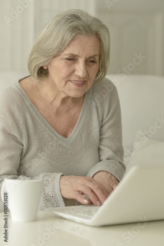 Senior woman with laptop