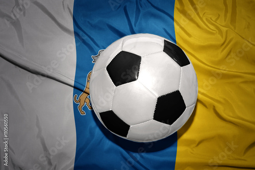 black and white football ball on the national flag of canary islands