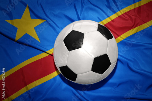 black and white football ball on the national flag of democratic republic of the congo