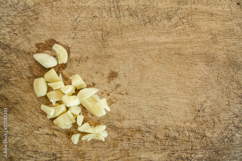 chopped garlic  on a wooden