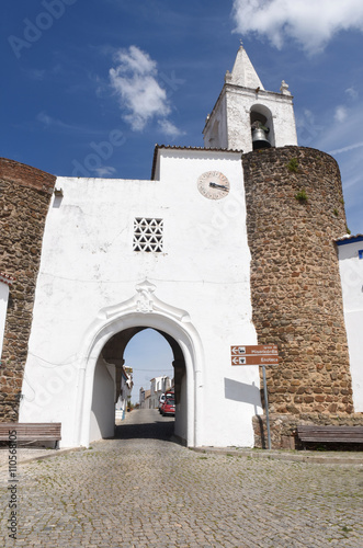 Door to the castle and church in the village of Redondo, Alentej photo