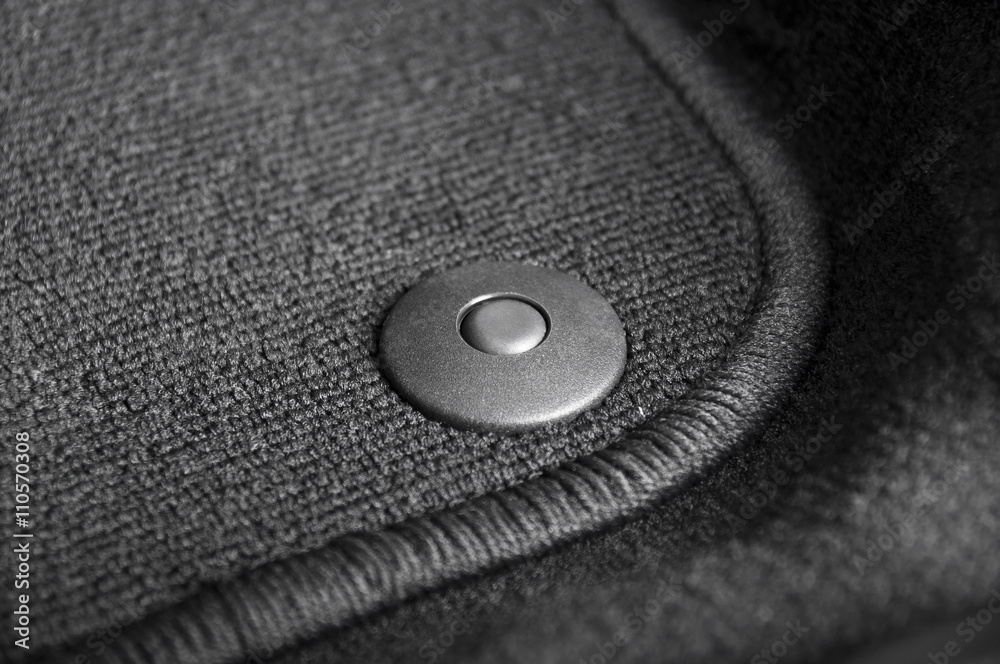 Corner of car mat with floor holder Corner of car mat with floor holder