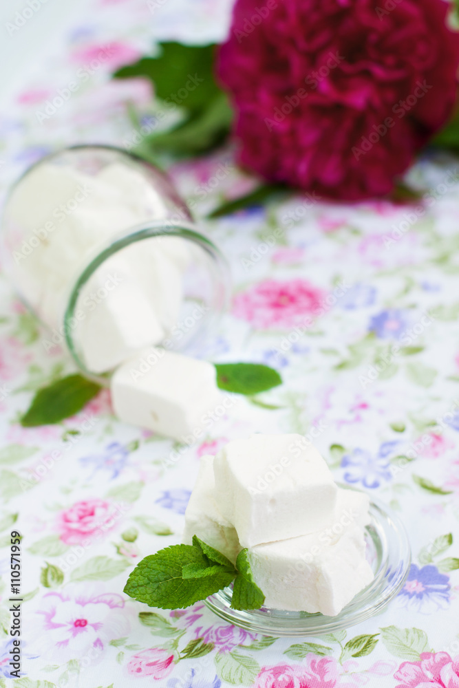 White marshmallows in a glass jar White marshmallows in a glass jar