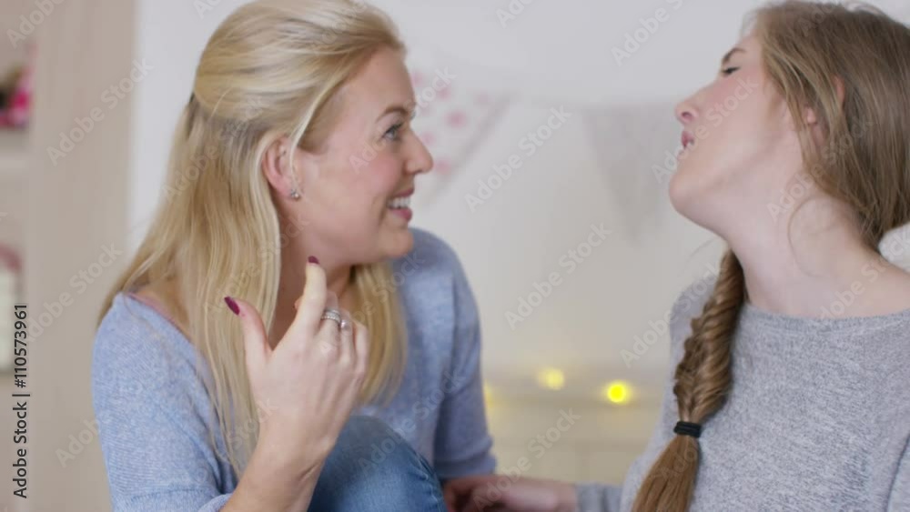 Portrait of happy teenage girls hanging out in bedroom Portrait of happy teenage girls hanging out in bedroom