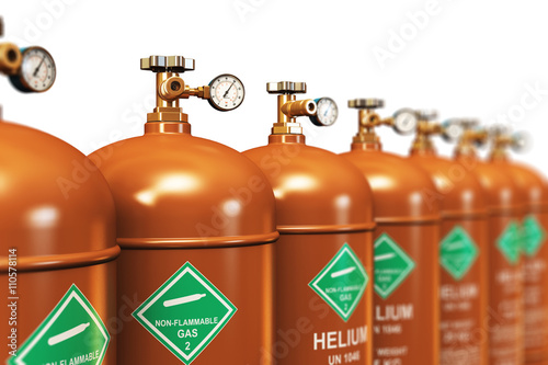 Row of liquefied helium industrial gas containers photo