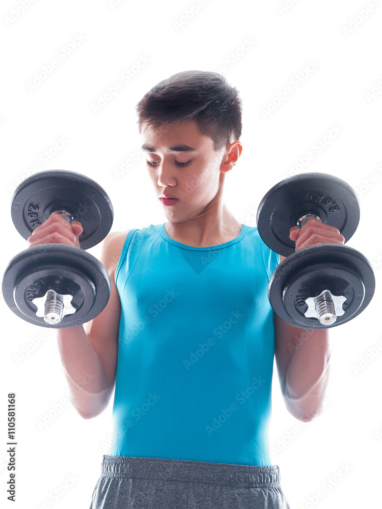 teenage boy during muscle building exercise teenage boy during muscle building exercise