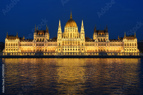 Budapest Parliament in Hungary at night on the Danube river © hnphotography