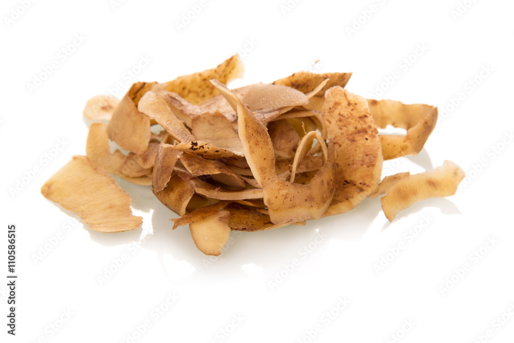 Garbage. Potato peelings isolated on white Garbage. Potato peelings isolated on white
