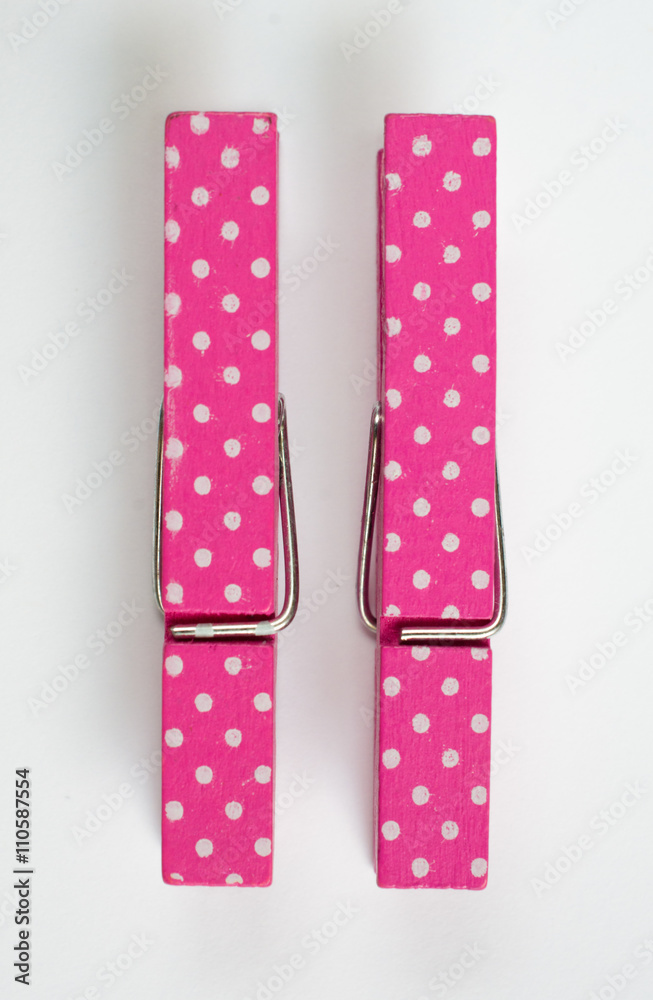 Two Pink Clothes Pins with Fun Patterns Top View Two Pink Clothes Pins with Fun Patterns Top View