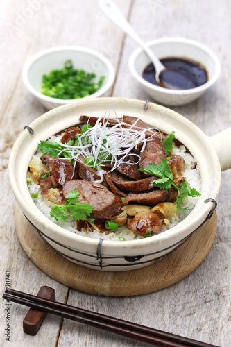 chinese sausage and chicken with rice in clay pot, cantonese food