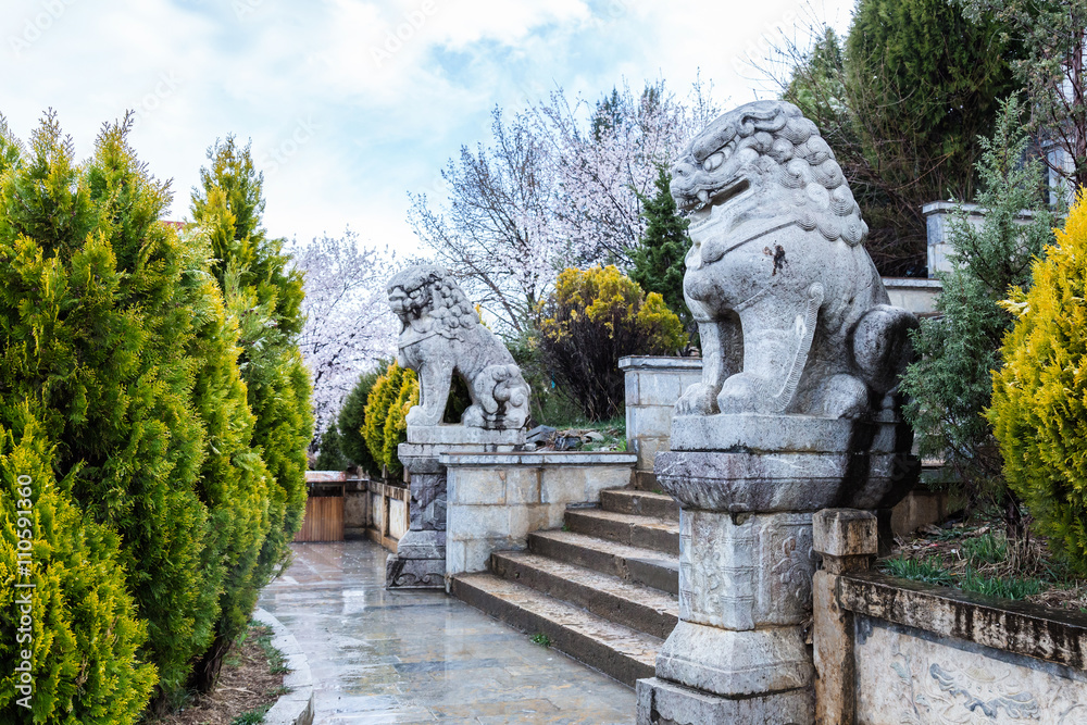 Ee Ka stone carving in the garden