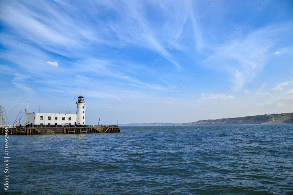 Scarborough lighthouse viewed from the harbour. In Scarborough, England. On 5th May 2016.