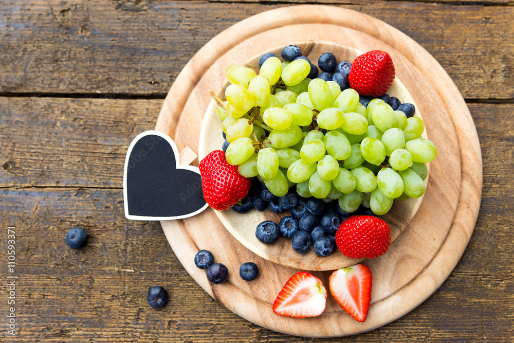 flat lay, fresh fruits with a heart slate on wooden table, copys flat lay, fresh fruits with a heart slate on wooden table, copys