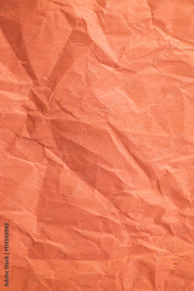 Red crumpled paper texture for background.