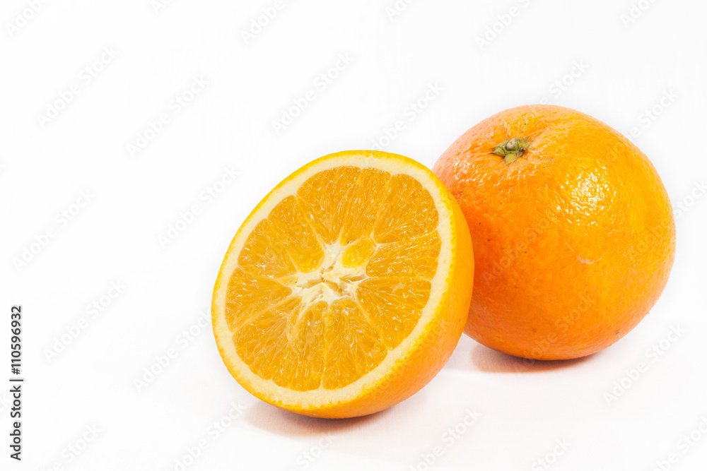 Sliced orange fruit with leaves isolated on white background Sliced orange fruit with leaves isolated on white background