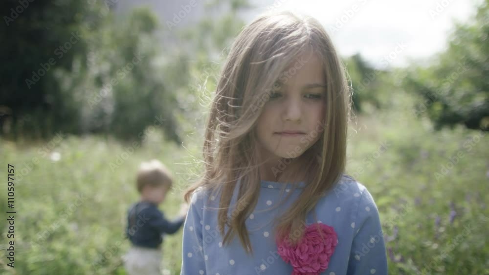 Portrait of happy little girl playing outdoors. Portrait of happy little girl playing outdoors.