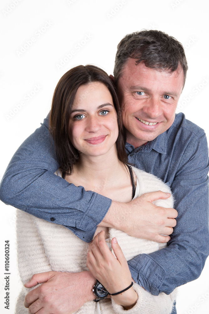 Cheerful father and daughter together isolated and smiling Cheerful father and daughter together isolated and smiling