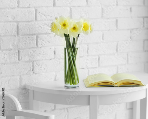 Fresh narcissus flowers and...
