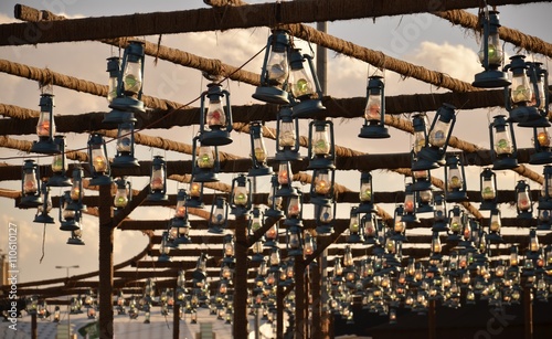The Tribune Lanterns,

The Tribune Lanterns, Souk Okaz Exhibition, Thaif, Saudi Arabia.

Yearly exhibition on Thaif Area, Saudi Arabia. These lanterns located on tribune of Souk Okaz Opera.