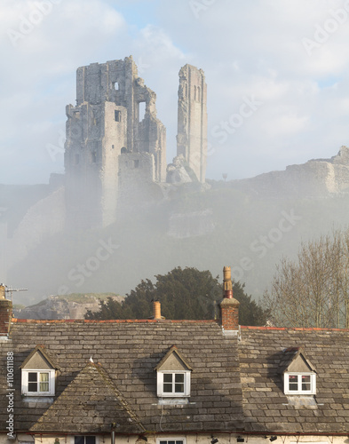 history of castle ruin in mist with roof