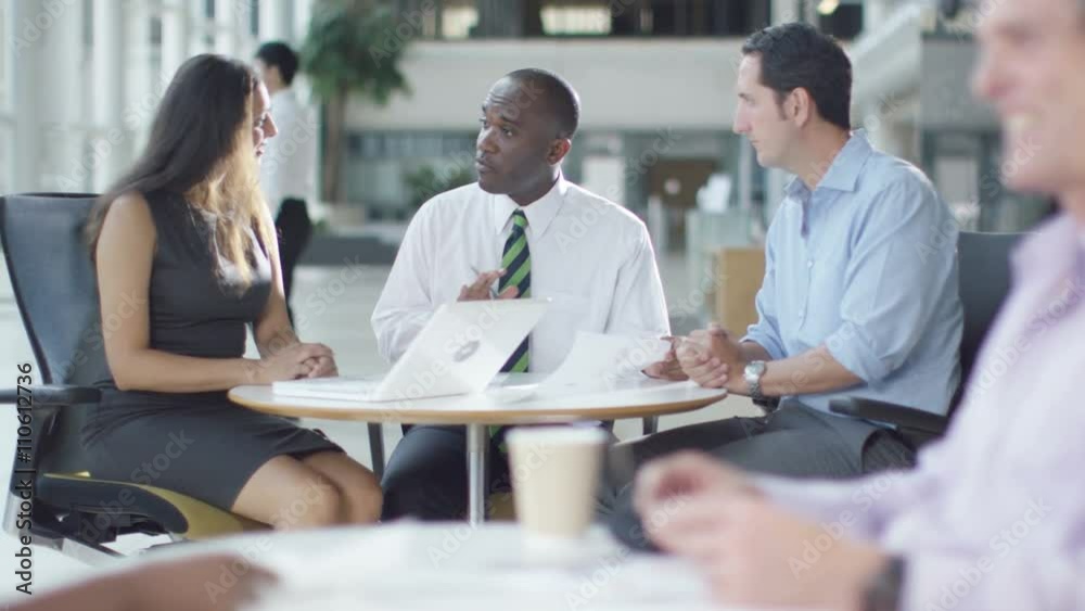 Business group in negotiation meeting shake hands on a deal. Business group in negotiation meeting shake hands on a deal.