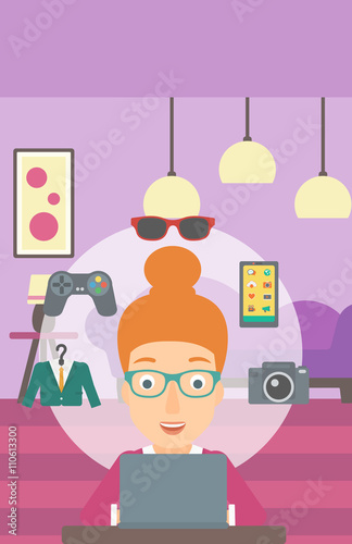 Woman shopping online using her laptop.