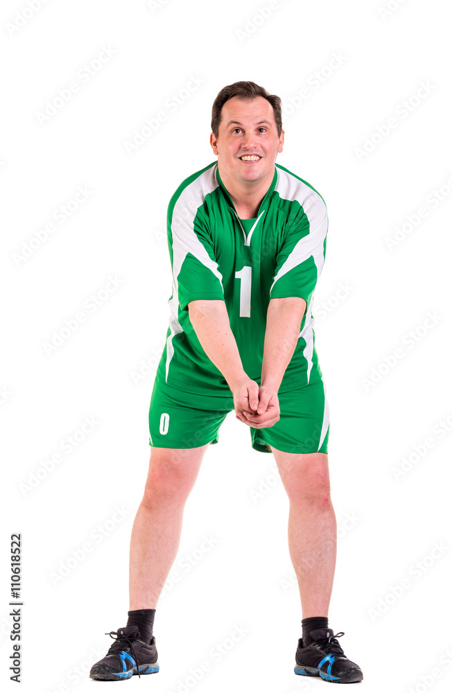 Mature man dressed in green sportswear posing Mature man dressed in green sportswear posing