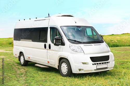 white minibus on in the field