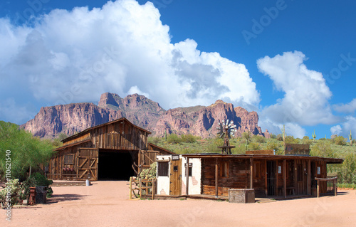 Photography Abandoned Wild West town - Old Wild West town with mountains range in background