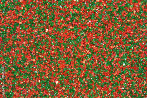 Christmas Sprinkles Candy Sugar in Red and Green Background